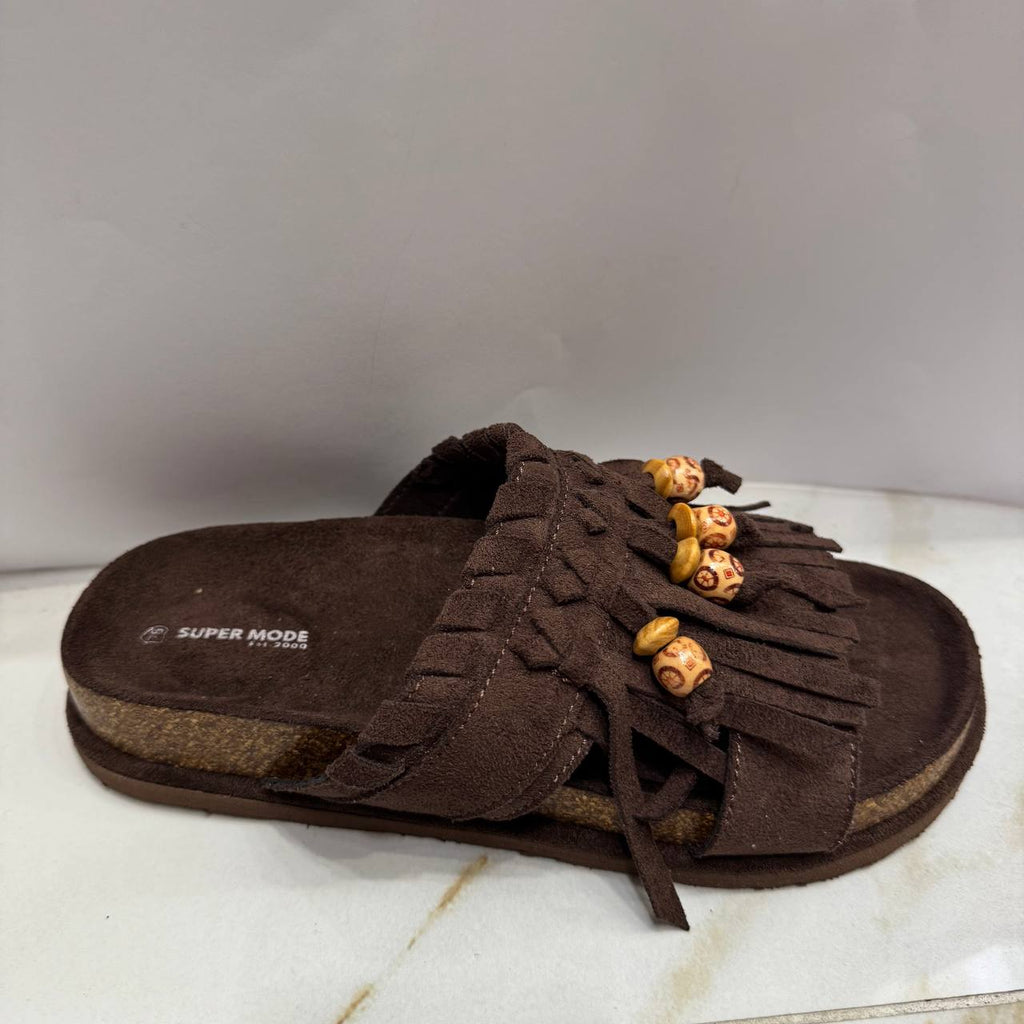 Pantofola con ciuffetti e dettagli etnici